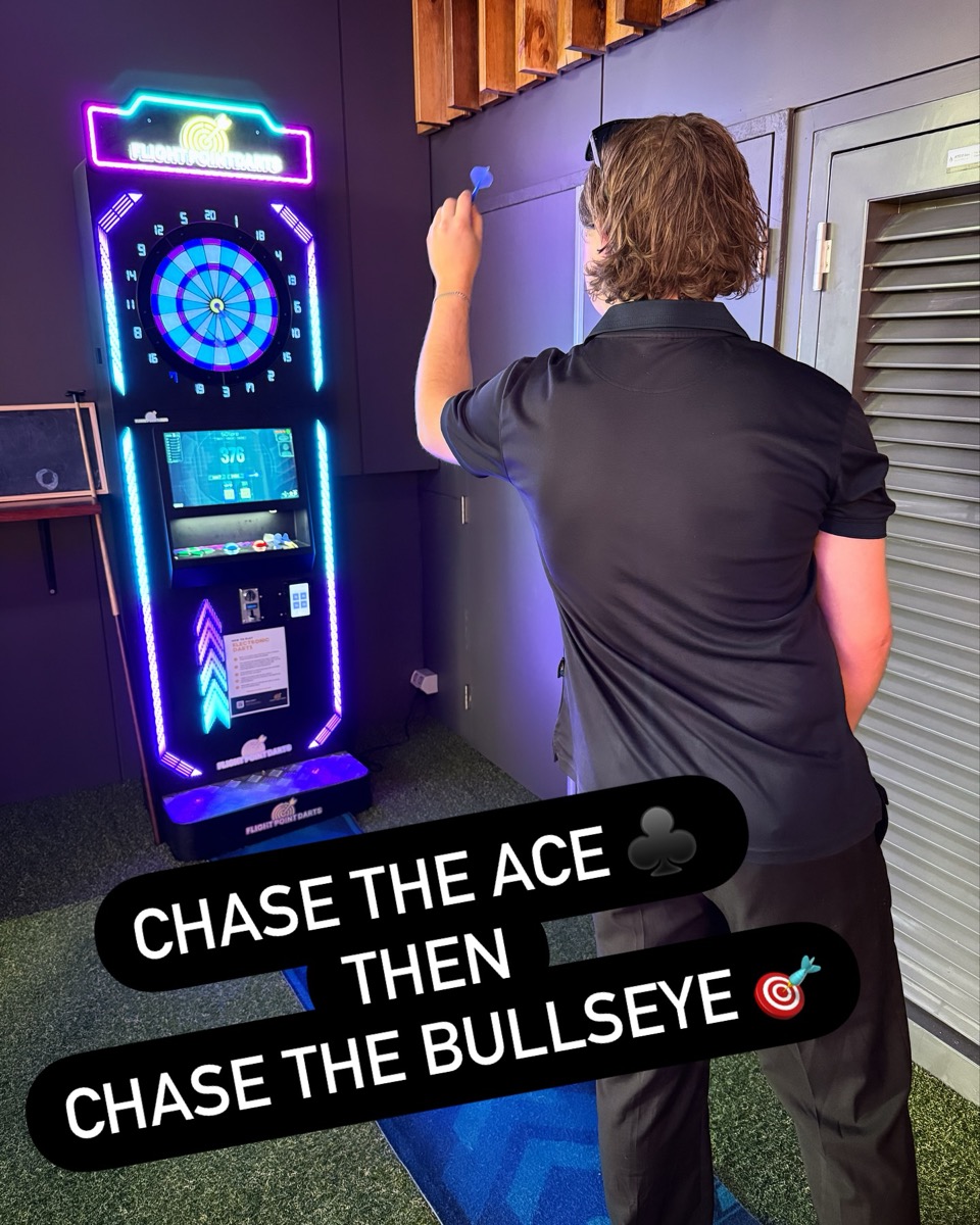 Player enjoying competitive dart gameplay